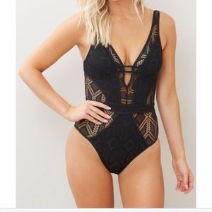Becca black lace one piece bathing suit
